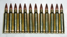 Load image into Gallery viewer, 223 REM, Brass casings and Full Metal Jacket bullets, lot of 12
